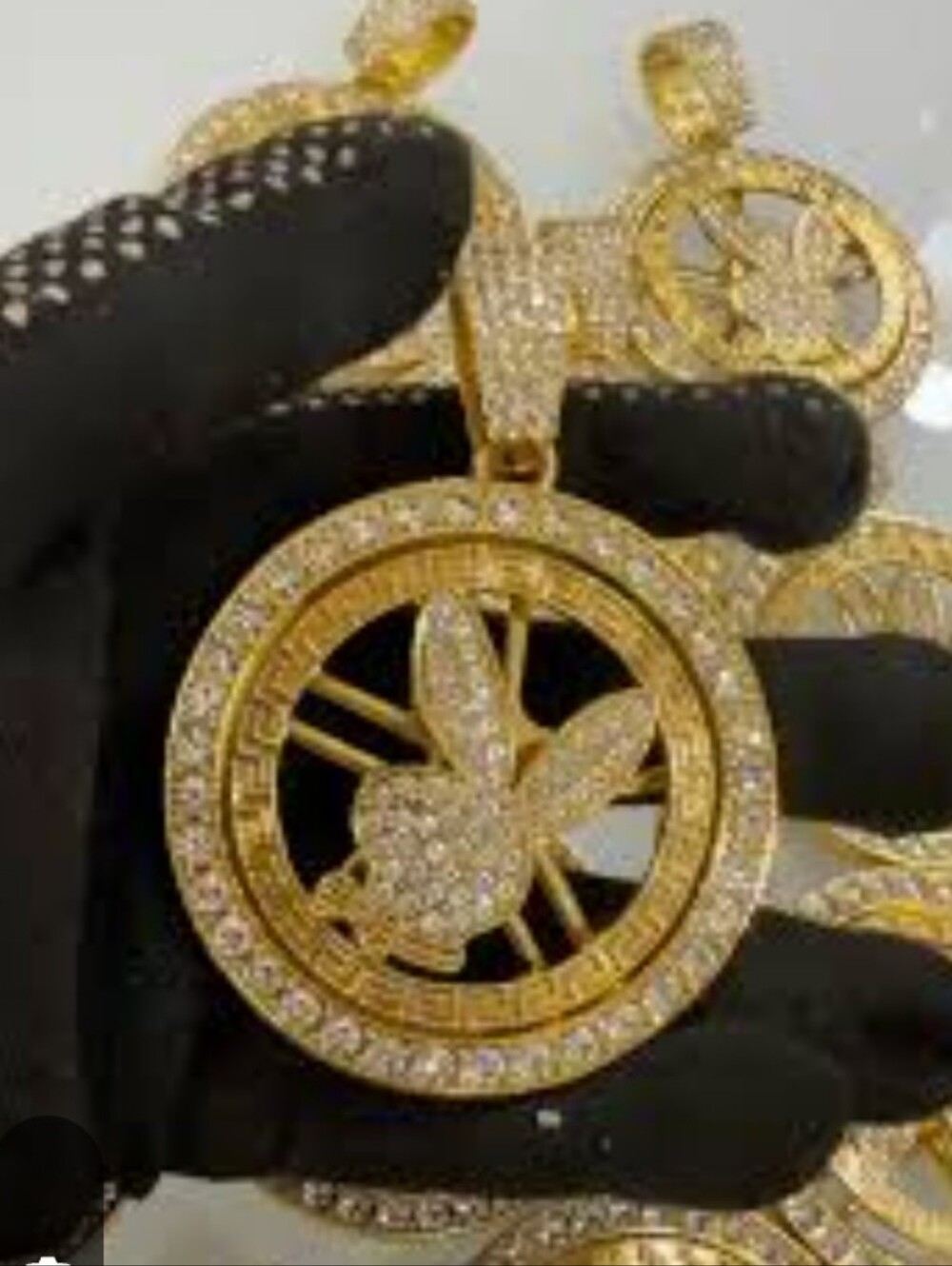 PLAYBOY Gold Tone and Crystal Logospinning Pendant✨